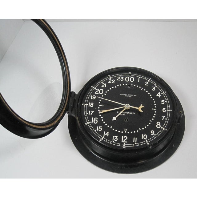 This vintage 24-hour clock, made by the Chelsea Clock Co., for the U.S. Government, is a functional and historically...