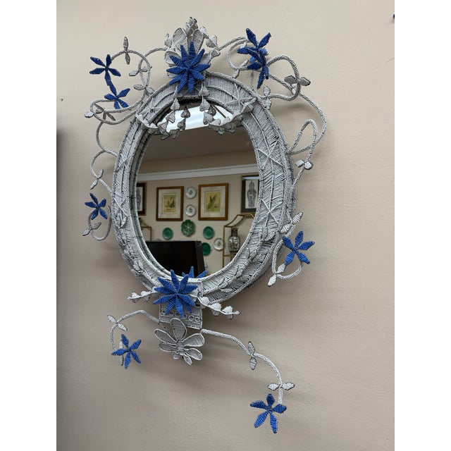 This mirror is a piece of art. It was hand crafted by village artisans from South Africa. The detail and design is so...
