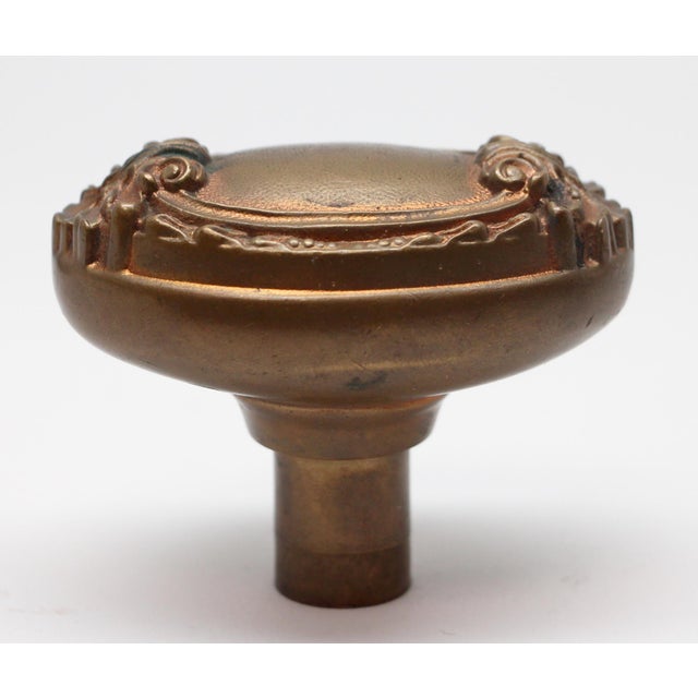 This Louis XV style oval knob is part of the N-11720 group. The manufacturer is unknown. It is made of bronze in an...