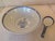 A large, 10-inch, serving bowl and spoon in the traditional blue and white rice eye pattern. Both bowl and spoon are in...