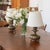 Stunning pair of antique metal table lamps from France, 1940s. Brass sculptural metal body with three claw feet detail....