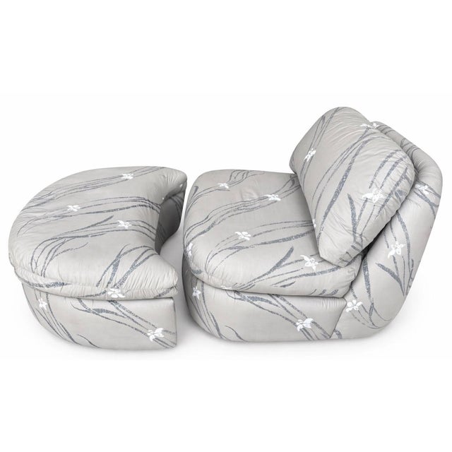 Vintage postmodern curved slipper chair with its matching ottoman. The design is heavily inspired by the sculptural,...