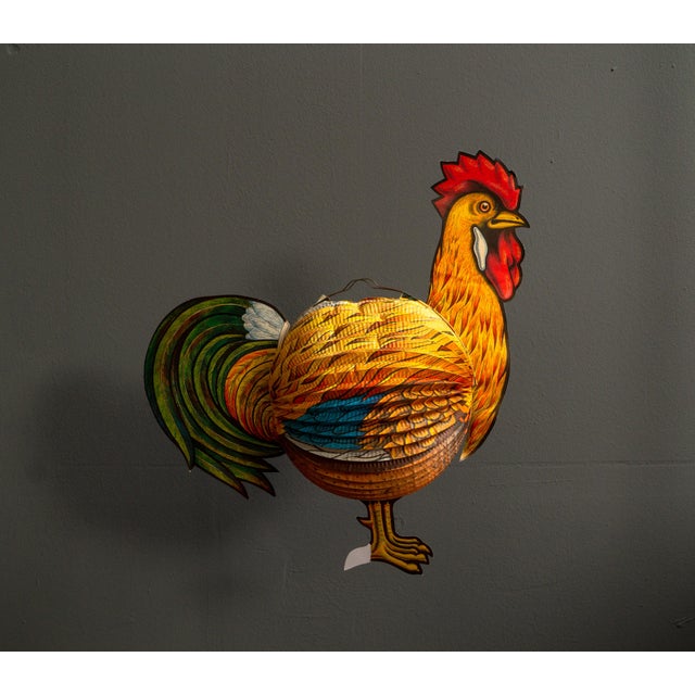 Paper lantern as a rooster, made in West Germany from the 60s. Rare lantern as a rooster figure, in the middle below, with...