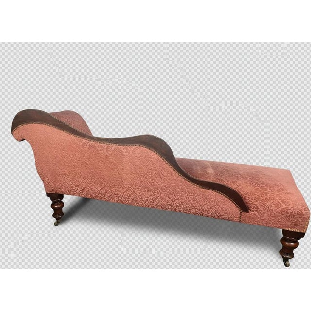 Beautiful Victorian chaise longue, an elegant long chair designed for reclining and relaxation. It features a classic...