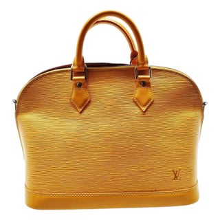 An Iconic 2007 Louis Vuitton Alma Yellow Epi Leather Hand-Bag For Sale