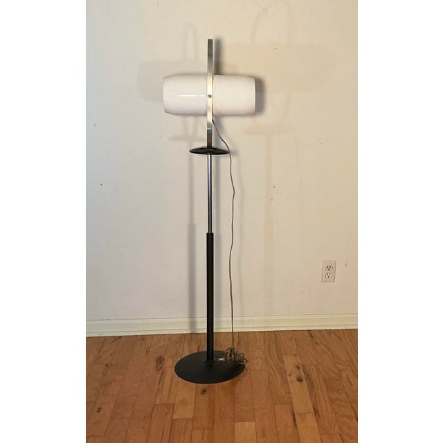 Vintage 1950s atomic bullet industrial metal floor lamp by Westinghouse. Lamp swivels so either side can be used. Standard...