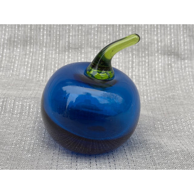 Vintage hand blown blue art glass tomato with a green stem. No marks. Tomato measures 2 1/2" by 2 1/2" by 3 1/4". Great...