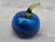 Vintage hand blown blue art glass tomato with a green stem. No marks. Tomato measures 2 1/2" by 2 1/2" by 3 1/4". Great...