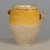 An earthenware confit pot from the Southwest of France with traditional yellow glaze. Minor losses to glaze. These...