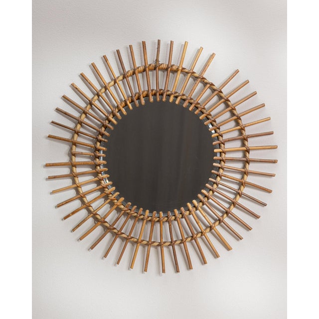 A mirror whose faux bamboo frame, natural brown wood, angled gives it real character at first glance. Dating to 1960s and...
