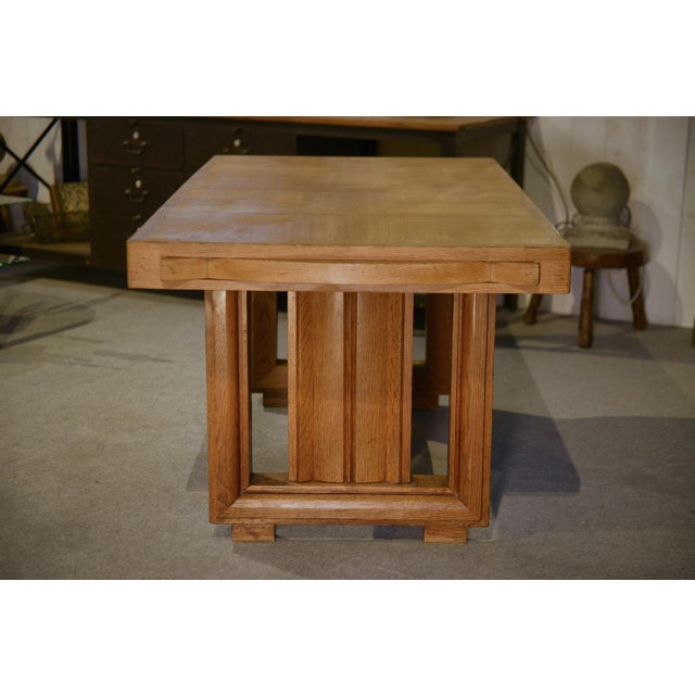 A powerful oak dining table, typical of French production in the 1940s. This table matches the sideboard, reference 2095....