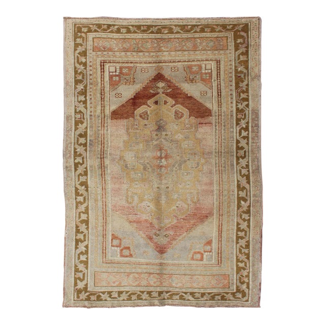 Vintage Turkish Oushak With Large Central Medallion in Cream, Yellow, Brown and Red 3'7"x5'8" For Sale