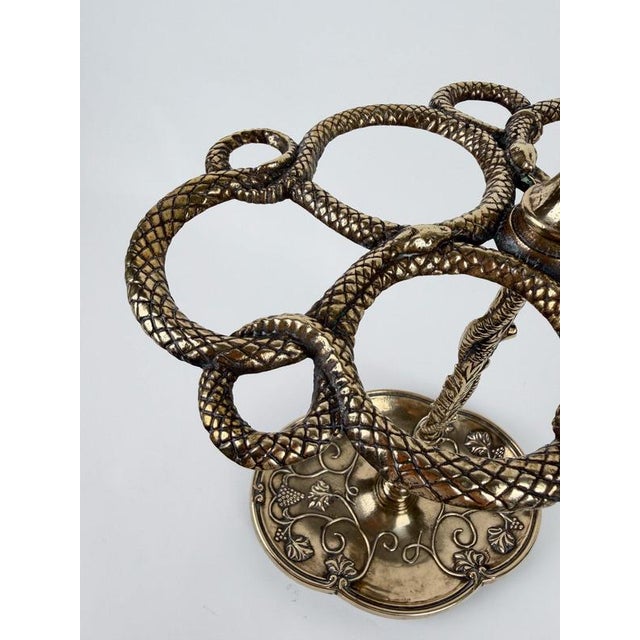 Splendid Italian cast brass umbrella and cane stand, richly decorated with an eye-catching intertwining of snakes and...