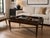 Designed by renowned designer Barbara Barry for Baker Furniture, this elegant mahogany coffee table embodies Barry’s...