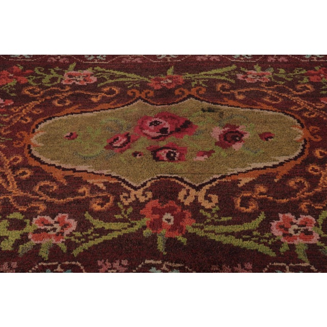 Hand-knotted in wool and originating from Turkey circa 1950-1960, this 5x7 vintage Tulu rug is an intriguing and rich...