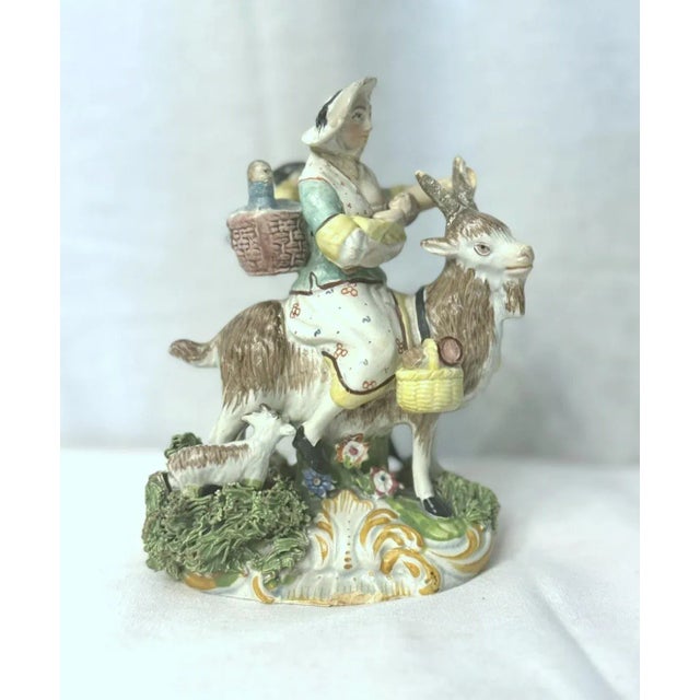 Fabulous Staffordshire figurine of "The Welsh Tailor's Wife", circa 1980's. The form of this character was based on Derby...