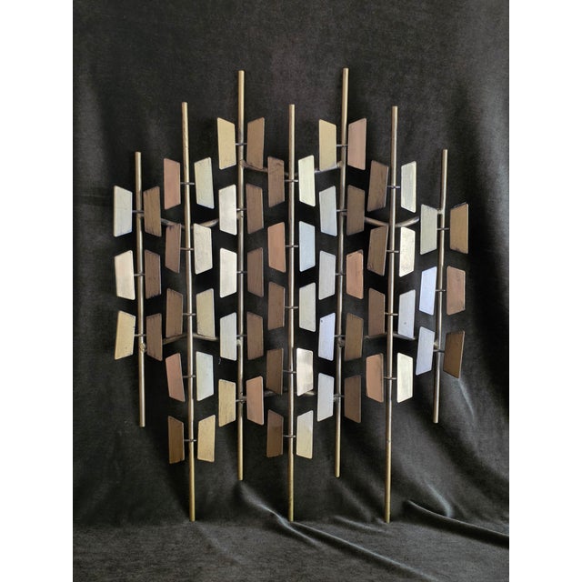 Bring Mid-Century Modern style to your decor with this Curtis Jere style Brutalist welded wall sculpture, this piece...