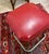 Vintage bar stool by Moderne Seating Co., showcasing a classic mid-century modern design with a vibrant red upholstered...