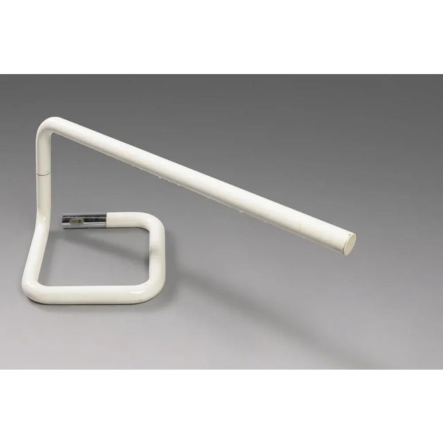 Large table/desk lamp in chromed and lacquered metal. The T450 model was designed by the architect Lucio Roncalli for the...