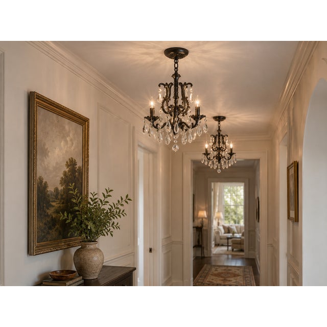 There is a particular pleasure in finding two of anything — and these chandeliers are a rare matched pair, ready to anchor...