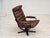 1970s, Danish swivel armchair by Georg Thams. Original brown furniture leather, bent beech wood, nubuck leather. Original...