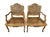 A fabulous pair of Louis XV caned armchairs with elegantly carved wood frames and an amazing finish and patina. The...