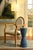 Brand new special order item. Not vintage. Elevate your living space with the Vivienne Steel Blue Stained Oak Drink Table,...