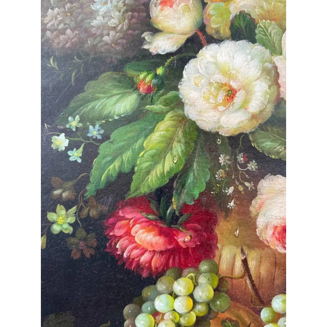An Oil on Canvas painting a a floral still life. This painting depicts a bouquet with various florals of many colors. The...