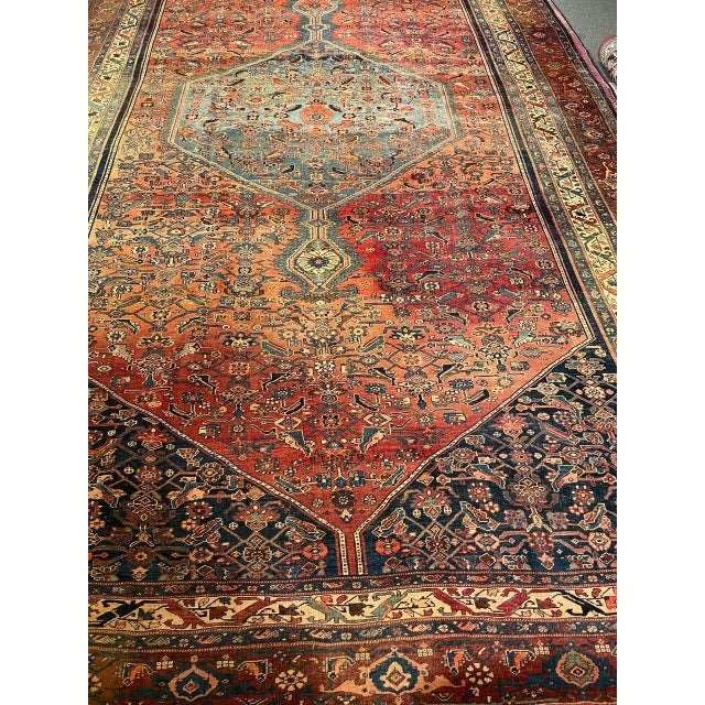 "Discover the masterful artistry of Persian rug weaving with this exceptional 19th Century Oversized Bidjar (Bijar) Rug,...