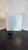 Model 611/g table lamp designed by Gino Sarfatti for Arteluce in 1973. Made with a reflective shade in polished Renal...