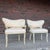 This is a pair of Louis XB style French accent chair. They feature a curved tufted back with gold and white floral accents...