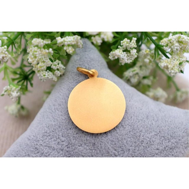 Saint John the Baptist 19.2k Gold Pendant, in Worn conditions. Designed 1920 to 1949