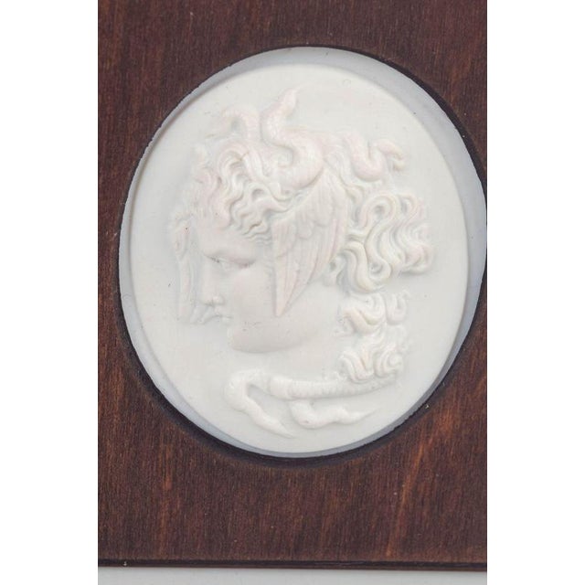 Meissen Biscuit plaque, c. 1970s. Small relief plaque in white biscuit porcelain depicting Medusa mounted in a square...