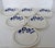 Set of 6 French stoneware salad plates in white glaze with bright cobalt nasturtiums and border decoration. Made by...
