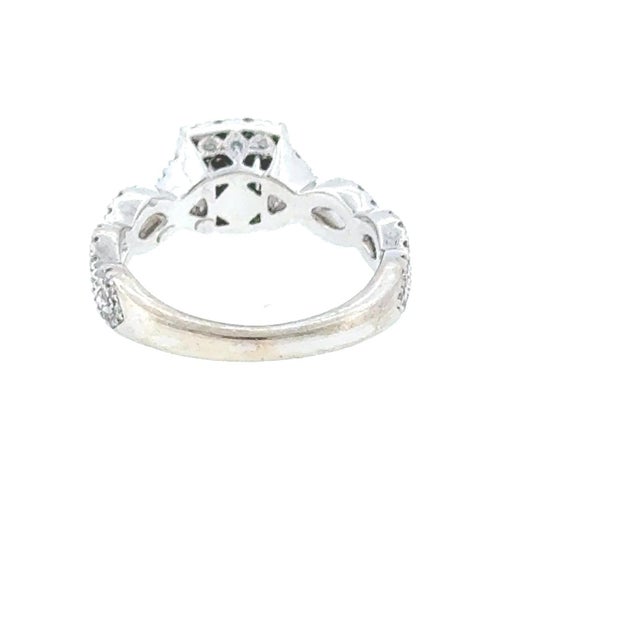 Elevate your engagement with this stunning Neil Lane designer ring. This elegant piece features a brilliant princess-cut...