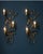 An elegant pair of large Italian Florentine wall sconces, beautifully crafted in gilt tole metal with richly detailed...