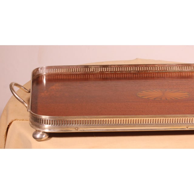 Lovely 19th-century English silver-plated and mahogany tray A beautiful large model with two handles, encircled by an...
