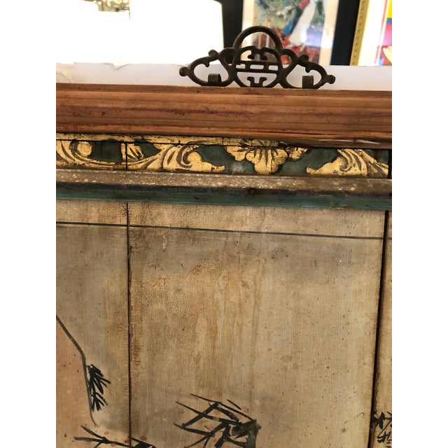 Impressive large pair of antique distressed original Chinoiserie paintings on wood panels having marvelous weathered...