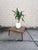 Mid-Century Single-Tiered Square Coffee Table with Glossy Laminate Top, Wood Legs and Brass Caps. Unknown Maker.