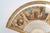 18th-century fan from the louis xvi era, displayed in its 19th-century gilded wooden stand. H: 40 cm, w: 56 cm, d: 3.5 cm