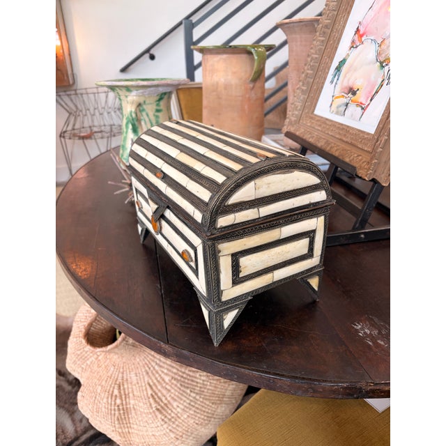 Small Horn Box. Ivory inlays with orange stones and metal accents. Velvet interior.