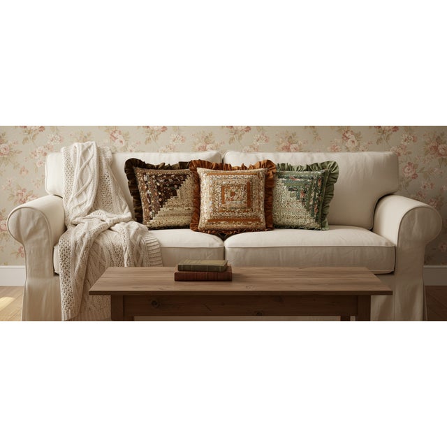 These pillows are designed with the Log Cabin quilt block pattern with a central square and surrounding fabric strips,...