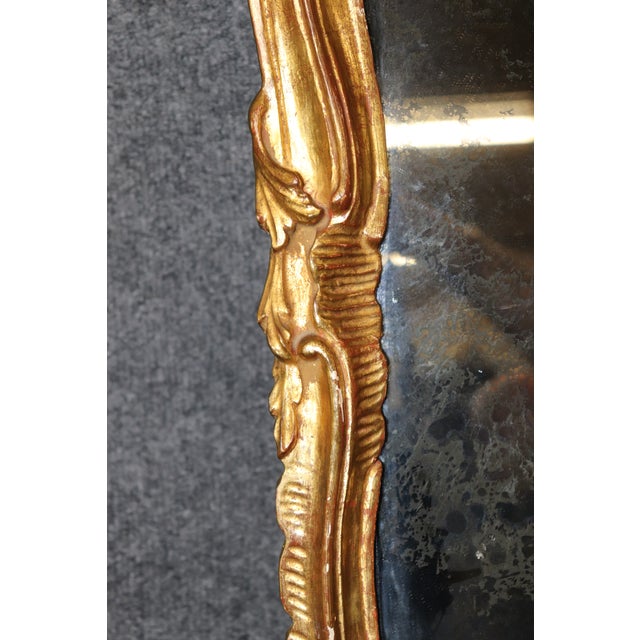 Gold Pair of Rare Tall Italian Rococo Style Distressed Carved Gilt Gold Mirrors For Sale - Image 8 of 10
