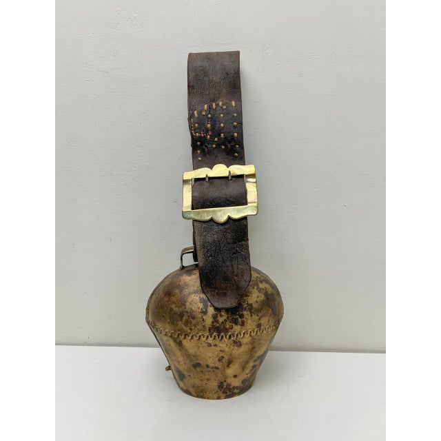 A very large and characterful old patinated metal bell from the alps in france or switzerland. This rustic bell was made...