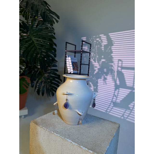 Feminine Grace This ceramic vase is a sculptural expression of soft elegance and natural beauty. Handcrafted from clay in...