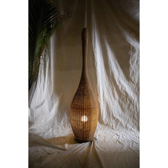 Bolla L floor lamp designed by Michael Sodeau for Gervasoni in 1999. Sculptural, slender structure entirely crafted from...