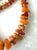 Gorgeous Baltic Amber necklace with turquoise beaded spacers, gold tone metal clasp. Vintage amber beads were used to...