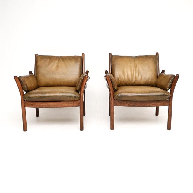 A stylish and very rare pair of vintage Danish armchairs by Illum Wikkelso. This model is called the ‘Genius’ lounge...