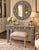 Striking handcrafted round wall mirror by Aditya Handicrafts of Jodhpur, Rajasthan, India, dating to 2021. The broad...