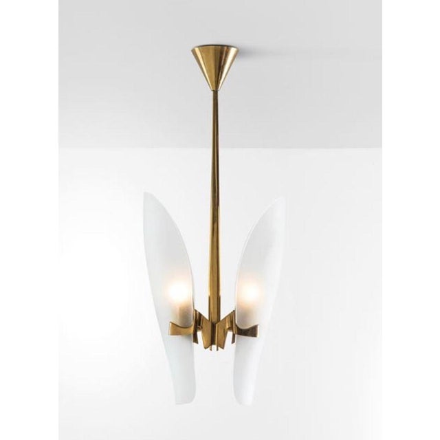 A rare and elegant Mod. 1636 vintage pendant light designed by Max Ingrand for Fontana Arte, Italy, circa 1950's. This...